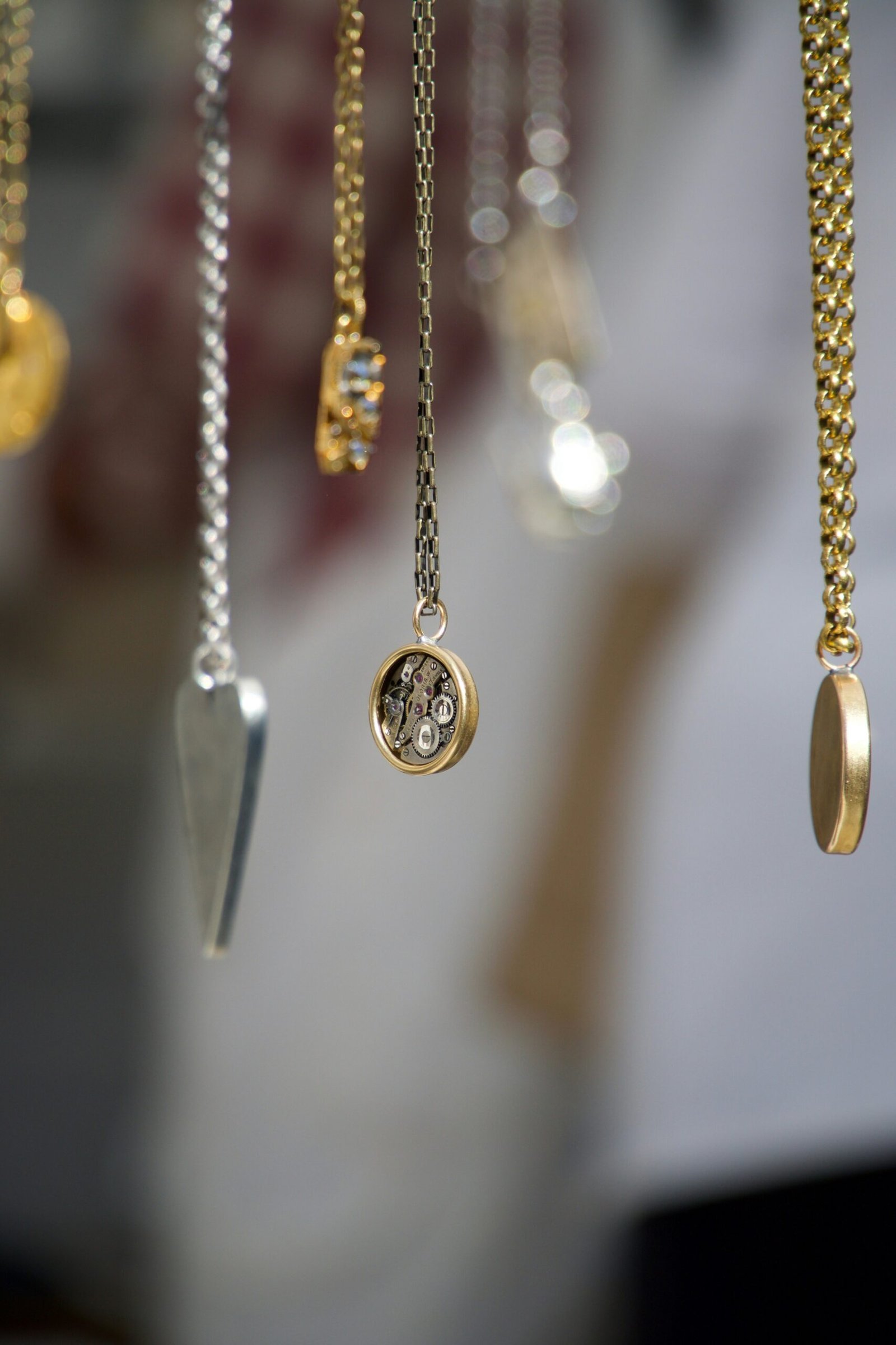 gold-and-silver-colored pendant necklace gold-and-silver-colored pendant necklace